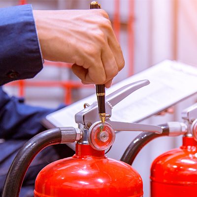 Engineer checking Industrial fire control system,Fire Alarm controller, Fire notifier, Anti fire.System ready In the event of a fire.